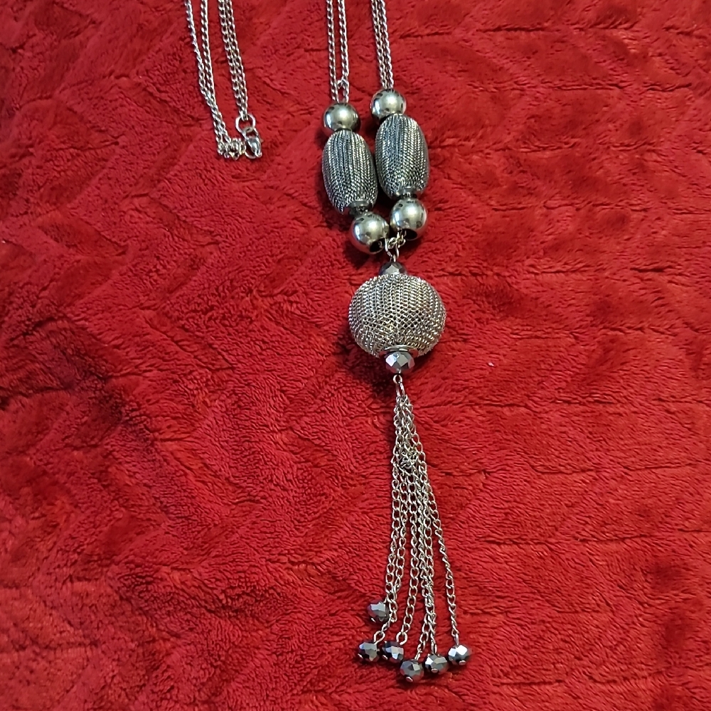 Elegant Silver Coloured Necklace with Tassel